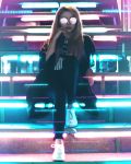 Trendy woman sitting on steps bathed in pink and blue light